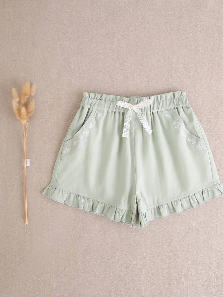 Shorts verts pour fille avec cordon et détails de poches pour la vente par Dadati