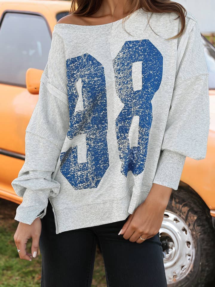 Fashion-W Faded Varsity Print Loose Pullover Top for wholesale by fashionworks