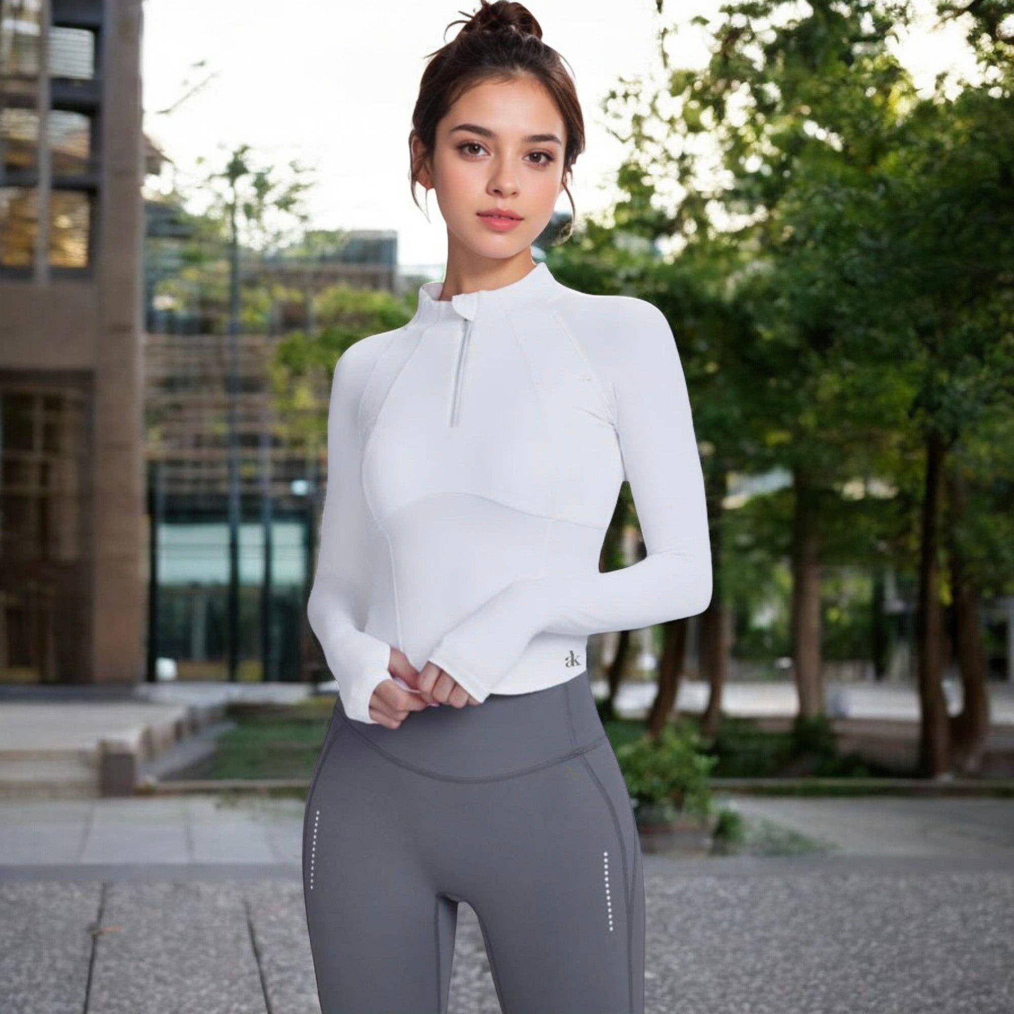 Active by Anna-Kaci - Wholesale Sporttop - Dames - Compressietop met lange mouwen en halve ritssluiting en contournaden18