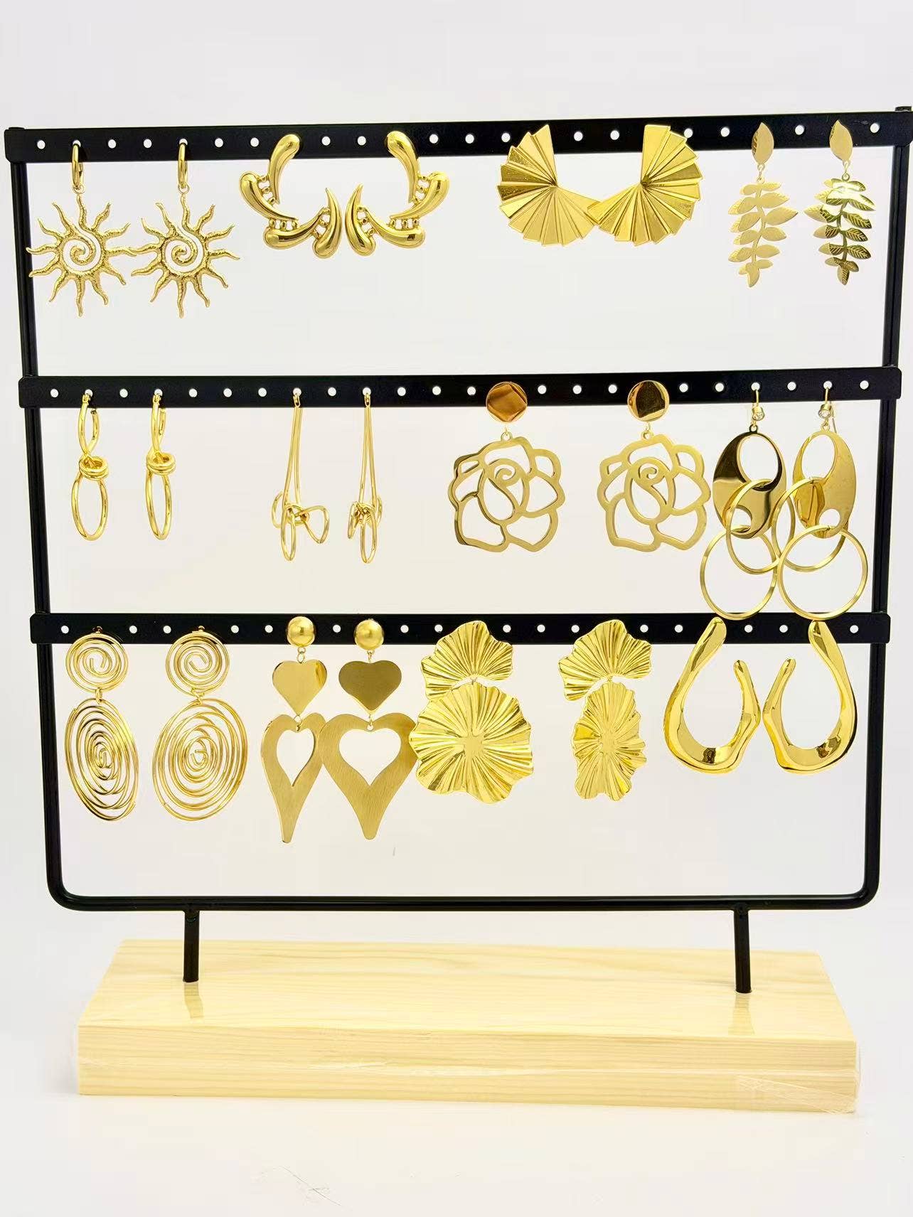 COSMOS - Wholesale Jewelry Set - Lot of 12 pairs of stainless steel earrings on display0