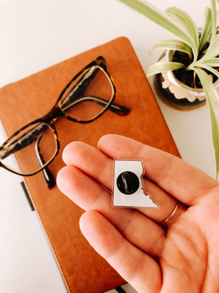 DC Acrylic Pin for wholesale by Dawning Designs