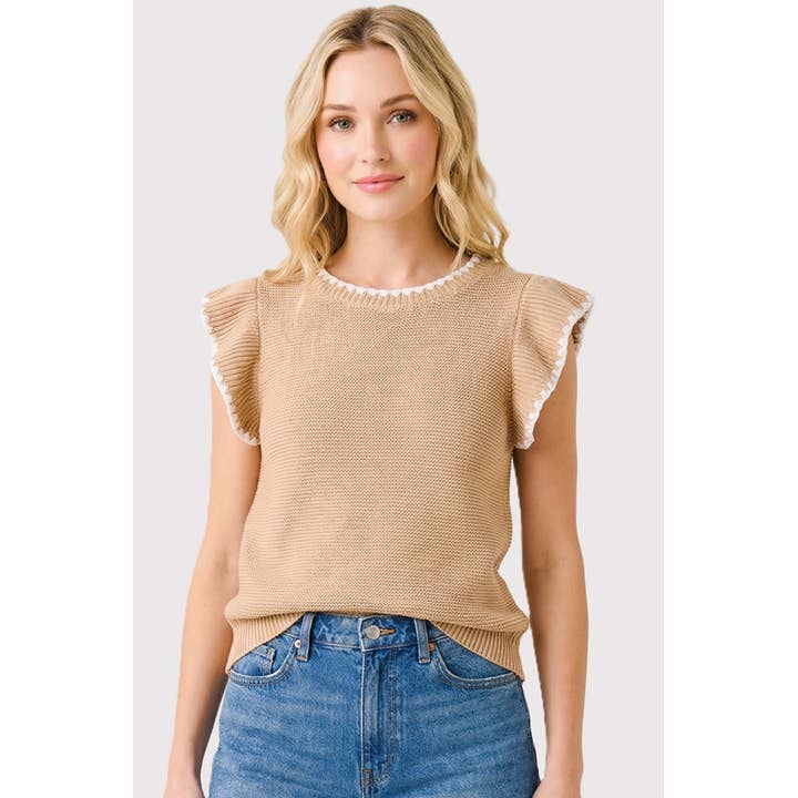 Pull à manches volantées, bordé au point de feston pour la vente par STACCATO