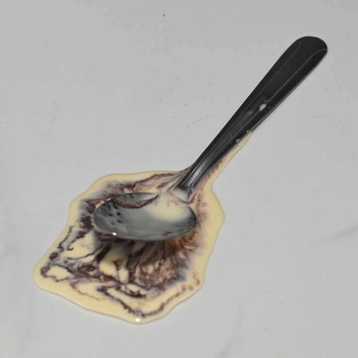 Spoon in Fake Melted Chocolate Ice Cream for wholesale by Just Dough It! Fake Foods
