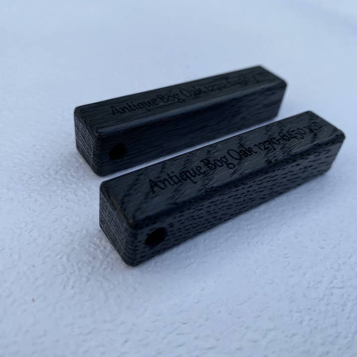 Bog oak keyrings 2 1/3"x1/2"x1/2" made from 6450 y.o. wood for wholesale by Antique Bog Oak