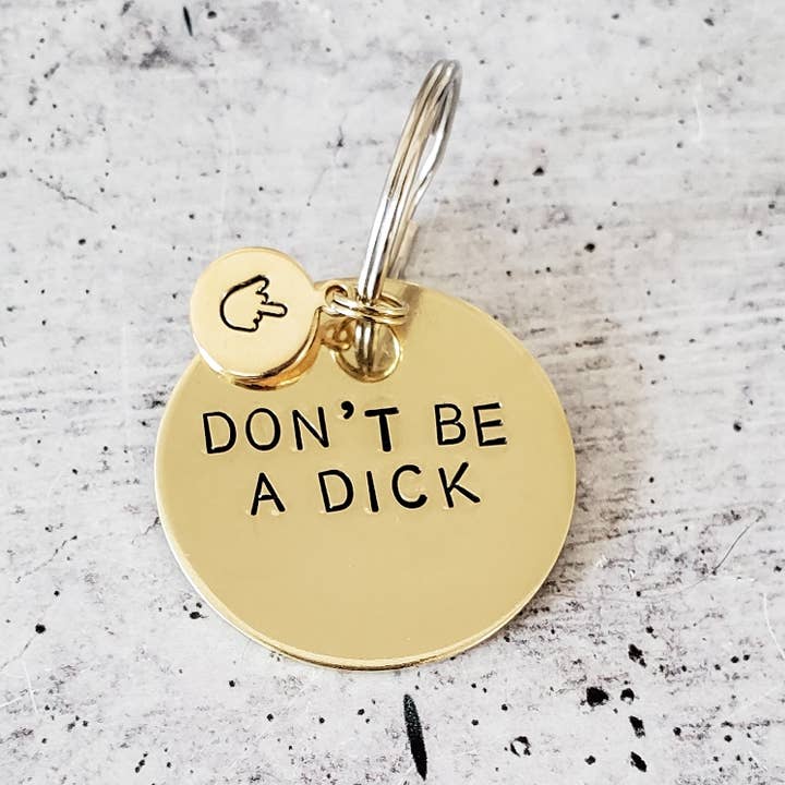 DON'T BE A DICK Brass Key Chain with middle finger accent for wholesale by Salt and Sparkle