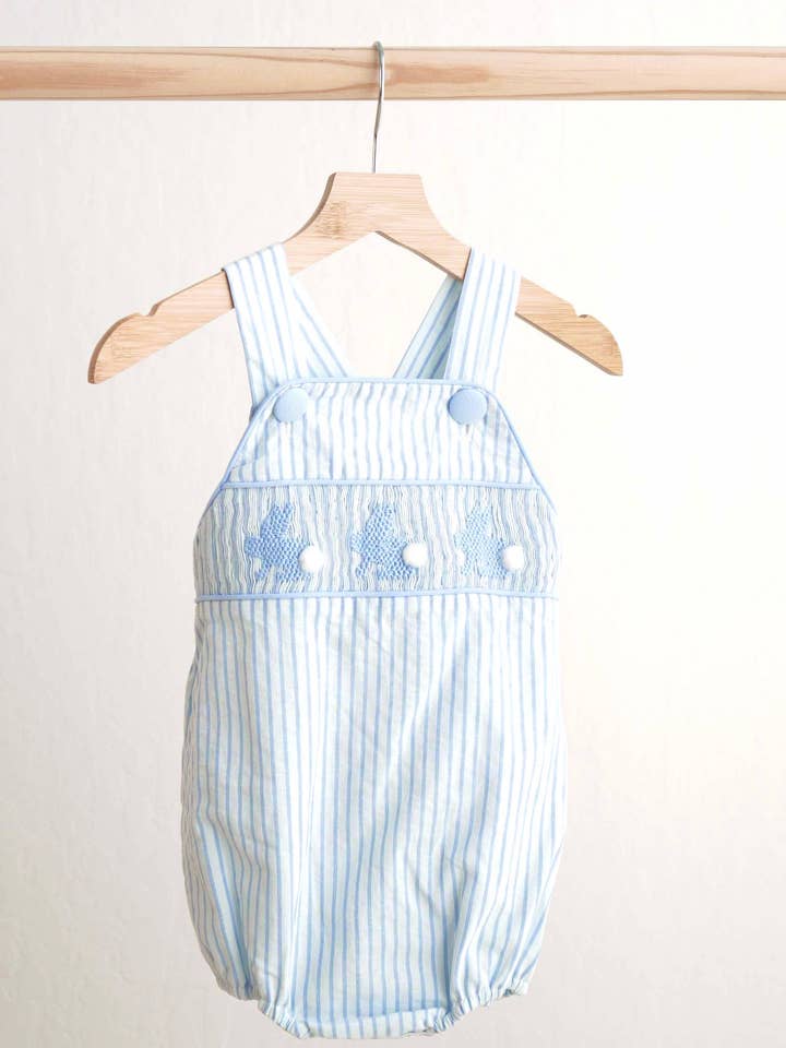 Blue easter bunny hand-smocked boy bubble for wholesale by Mom & Co.