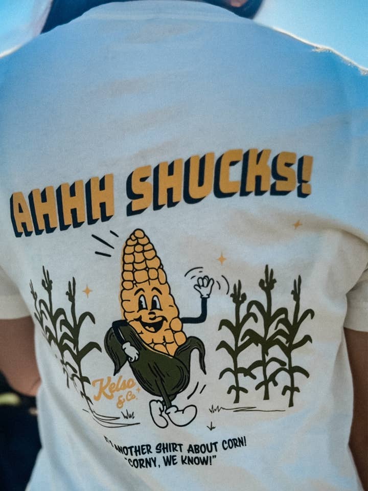 Ahhh Shucks Dancing Corn Graphic Tee in Heather Natural for wholesale by Kelso & Company