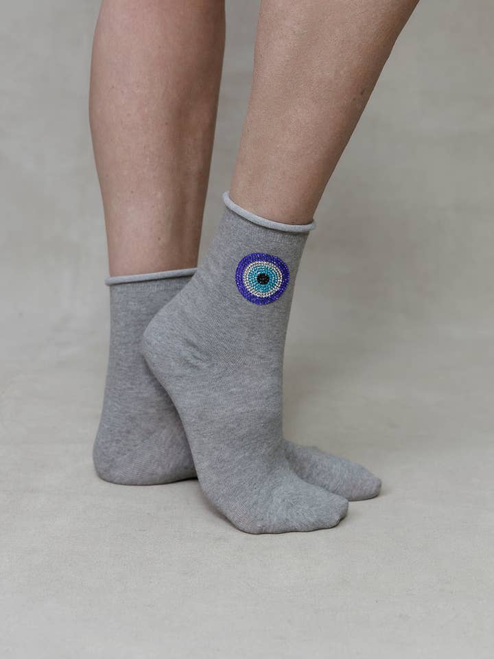 CALZINI ROTONDI IN CRISTALLO EVIL EYE per la vendita all'ingrosso da parte di limlim