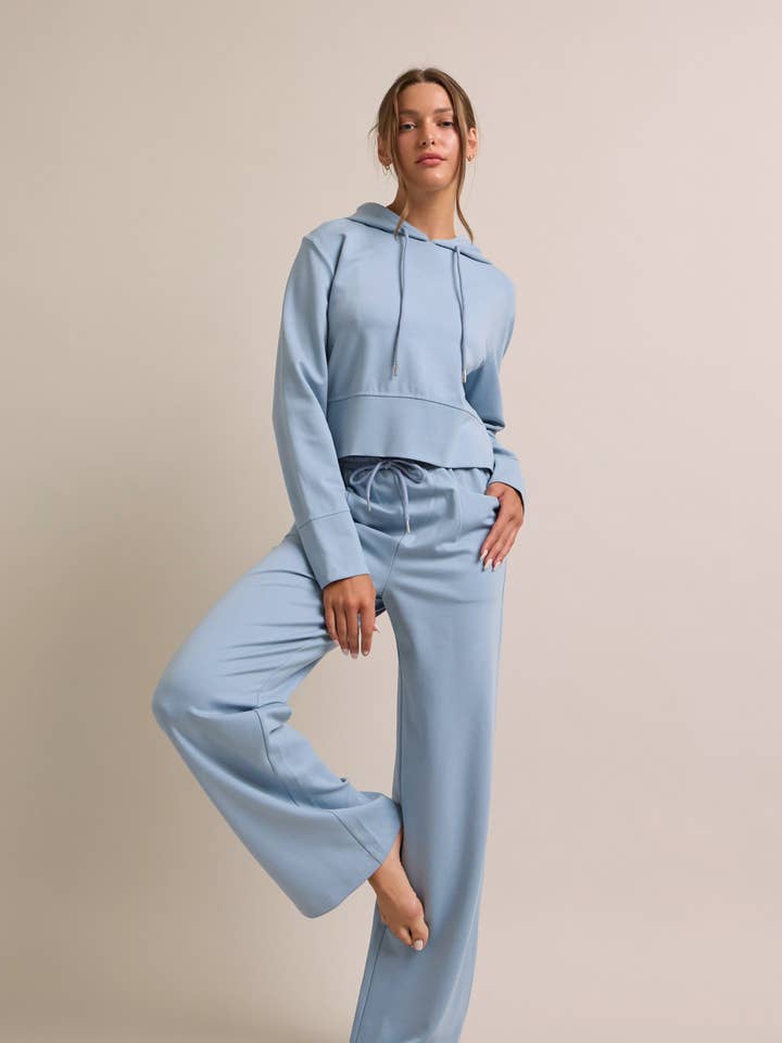 Set felpa con cappuccio e pantaloni larghi casual chic per la vendita all'ingrosso da parte di RIVIR