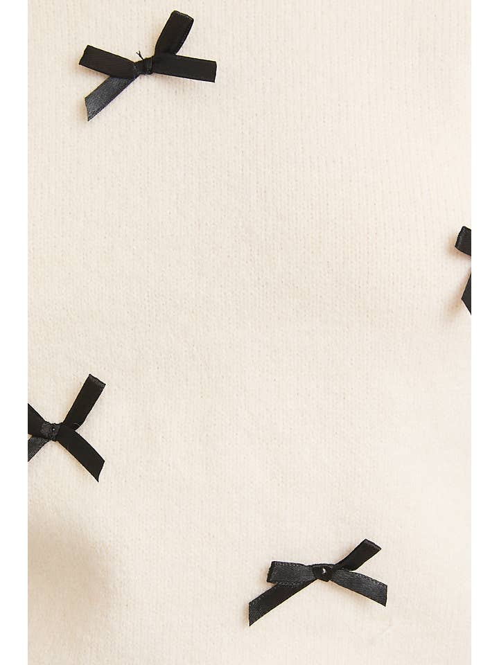 CREAM ROUND NECK LONG SLEEVE BOWS ON FRONT SWEATER for wholesale on Faire