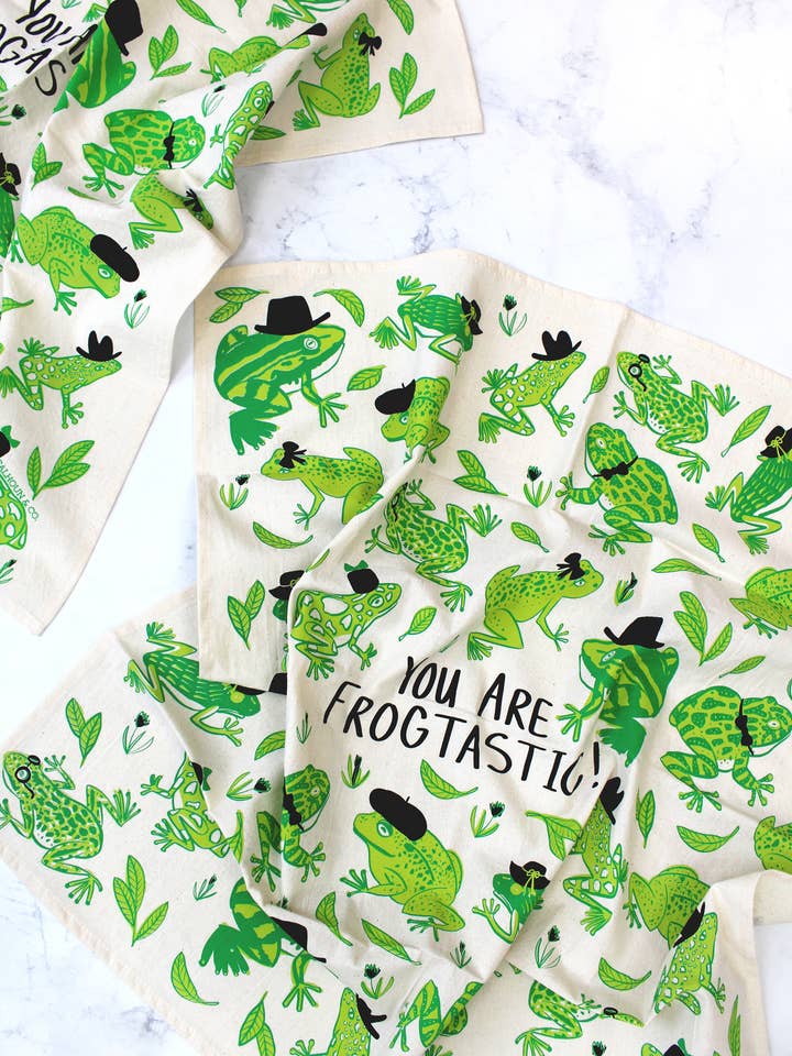 Frogtastic Tea Towel Frog Print Decor for wholesale by Calhoun & Co.