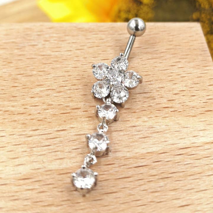 Silver color rhinestone paved flower belly button piercing for wholesale by MYLENE ET FELIX