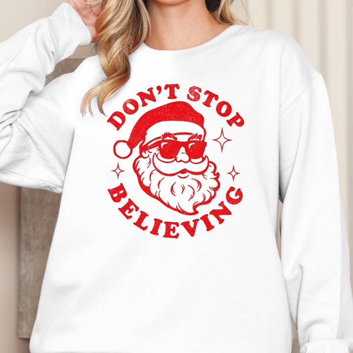 PULL IMPRIMÉ GRAPHIQUE NE CESSER DE CROIRE pour la vente par Amused by Blue