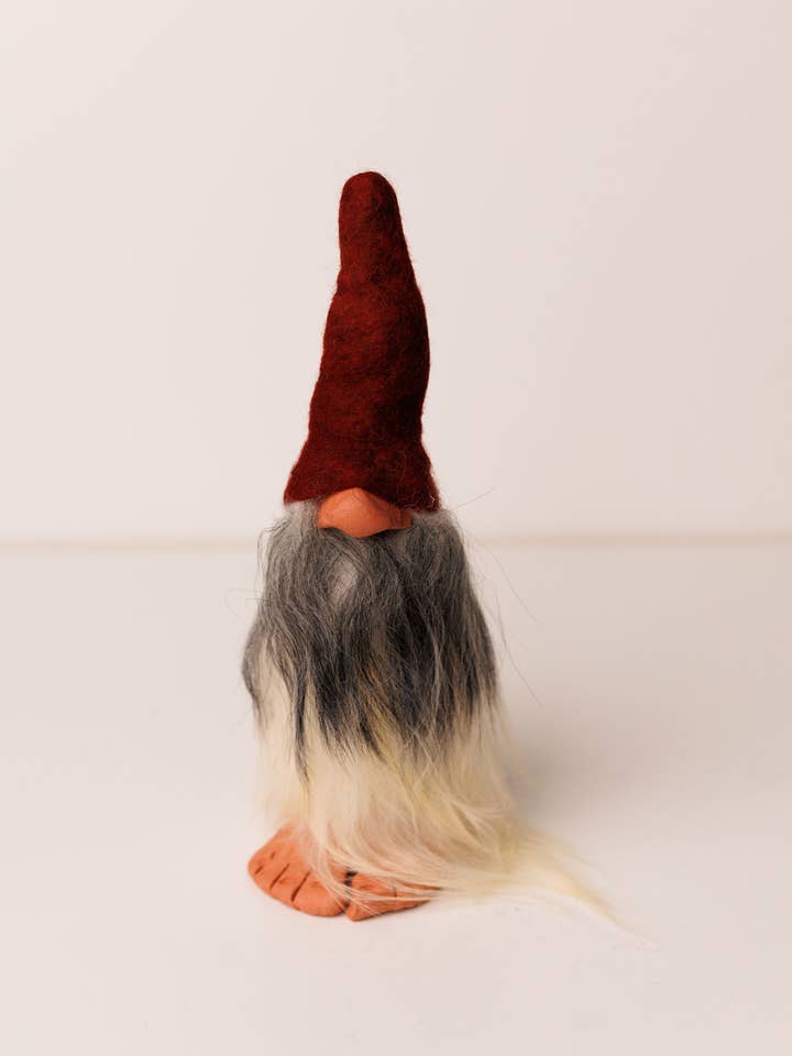 Small Red Foot Gnome Decorative Figurine for wholesale by Talla Imports