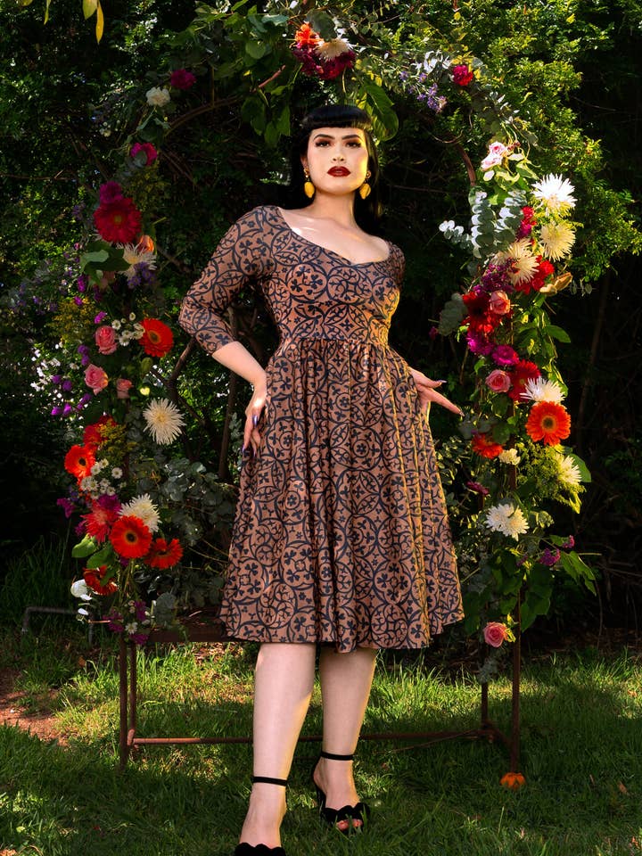 Priscilla Swing Dress in Gold and Black Medallions Print Stretch Twill | Laura Byrnes & Hope Johnstun for wholesale by Pinup Couture