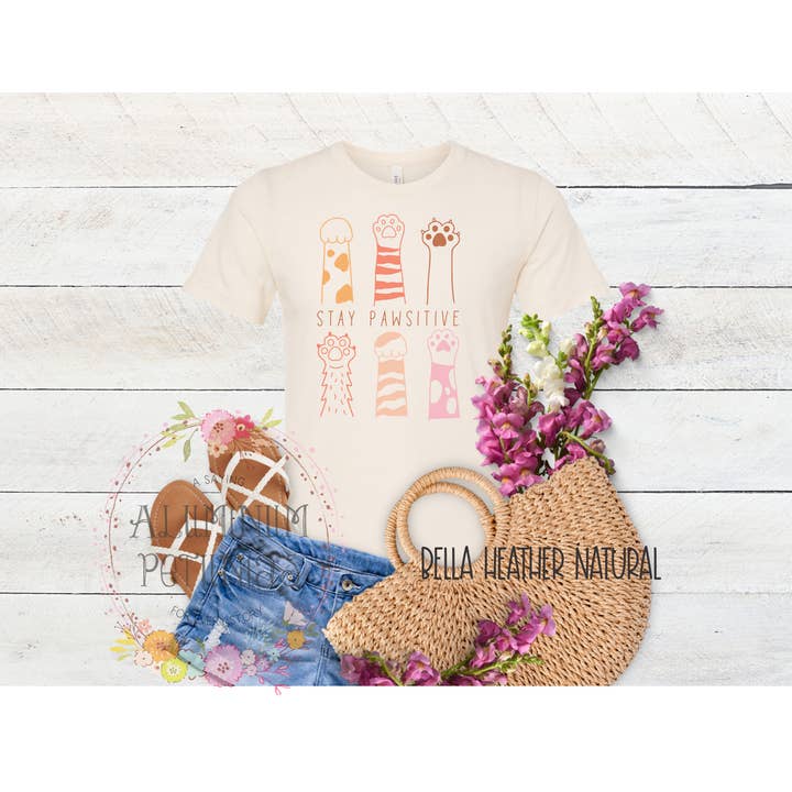 Stay Pawsitive Cat Funny Graphic Tee for wholesale by Aluminum Petunias