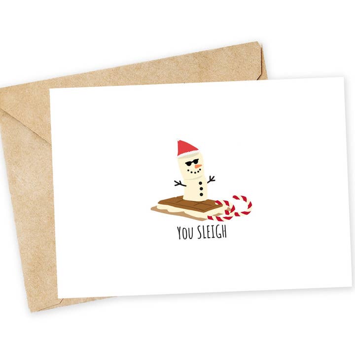 Funny S'mores Snowman Christmas Card - 'You Sleigh' for wholesale by Chewy Lemon Studio