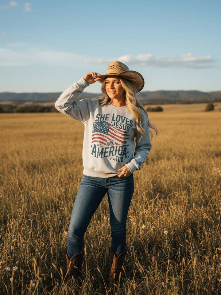 Sudadera Ella Ama a Jesús y a América para venta al por mayor de Wild Junkie