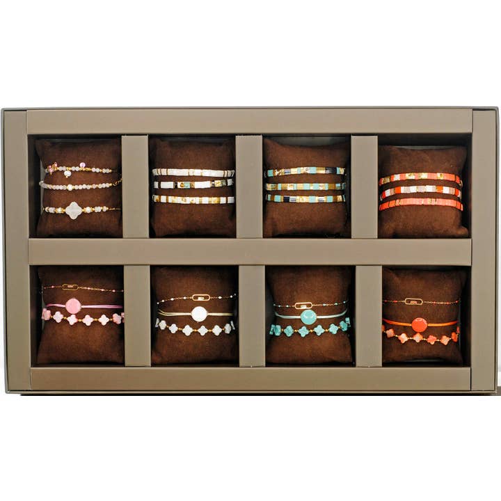 Coffret de 24 bracelets en perles, nacre et email pour la vente par Merveilles du Monde