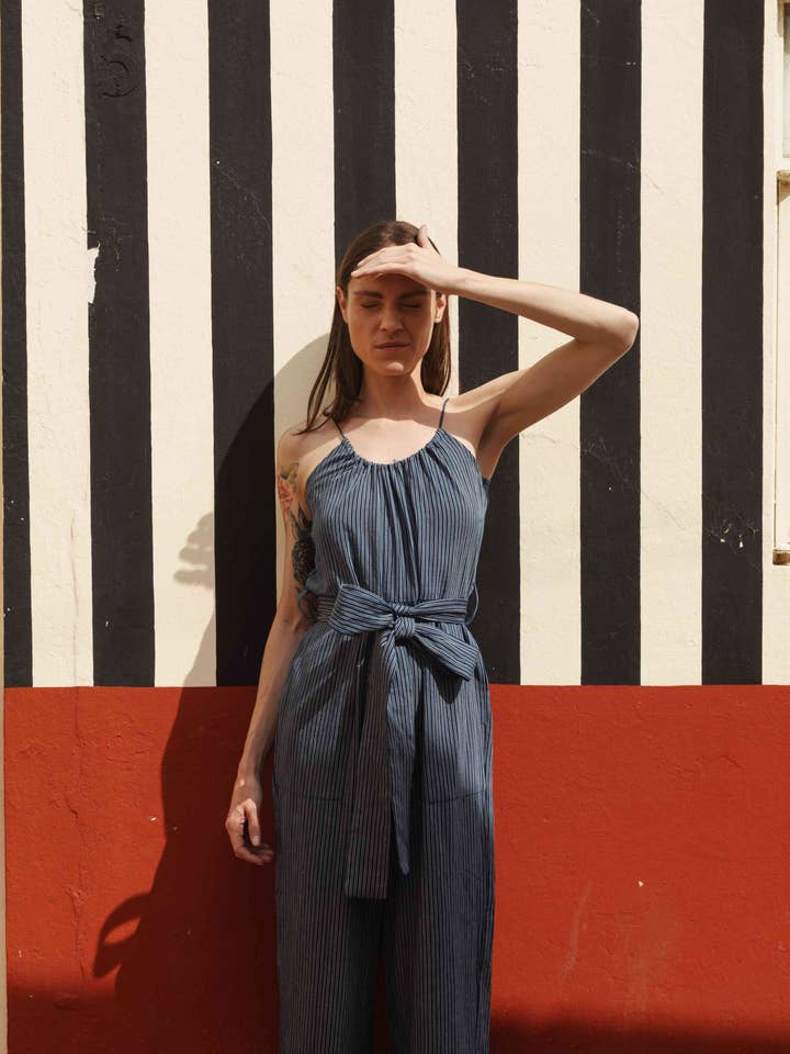Lila Jumpsuit in Engineered Twill Indigo Stripes for wholesale by Umber and Ochre