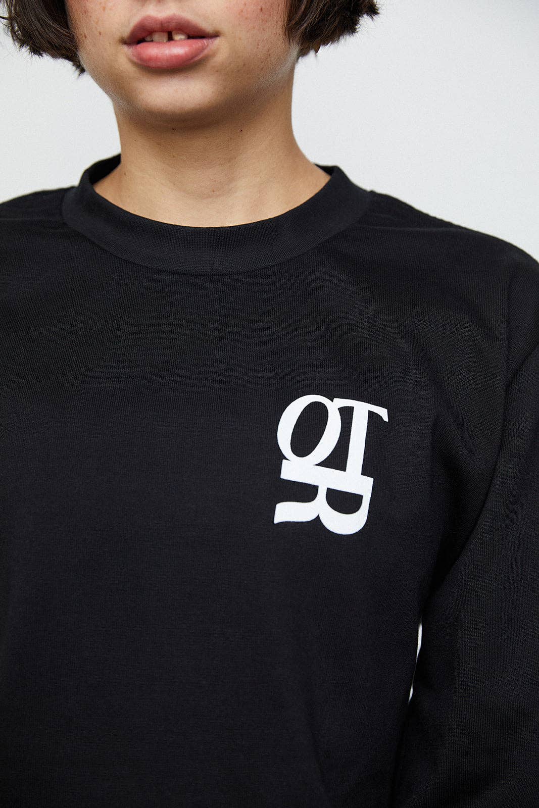 Black "CHANGE YOUR MIND" T-SHIRT for wholesale on Faire3