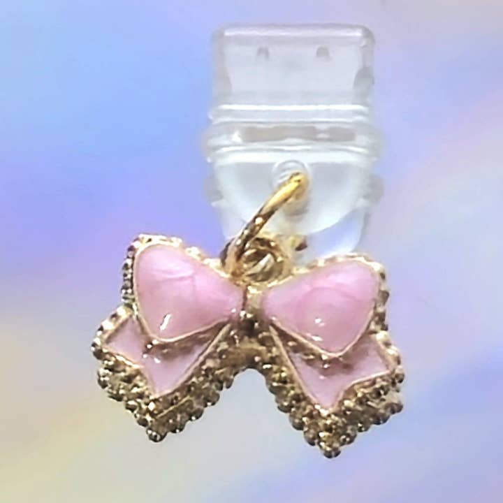 Double Bow USB-C Charm – Cute Dust Plug for Devices and other Purchase Wholesale dust plug. Free Returns & Net 60 Terms on Faire trending on Faire.