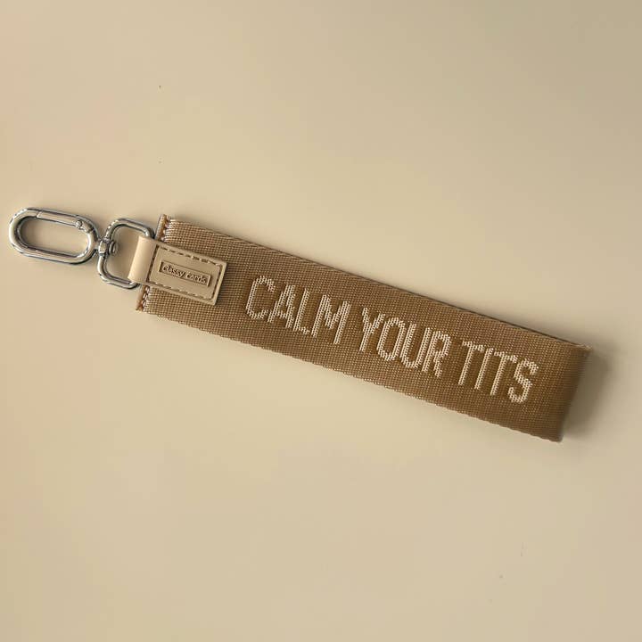 Portachiavi da polso "Calm Your Tits" per la vendita all'ingrosso da parte di Classy Cards Creative