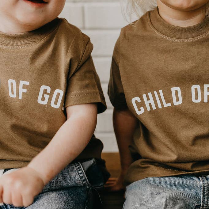 Child of God, faith based, Christian apparel for kids. and other Purchase Wholesale toddler pocket tee. Free Returns & Net 60 Terms on Faire trending on Faire.
