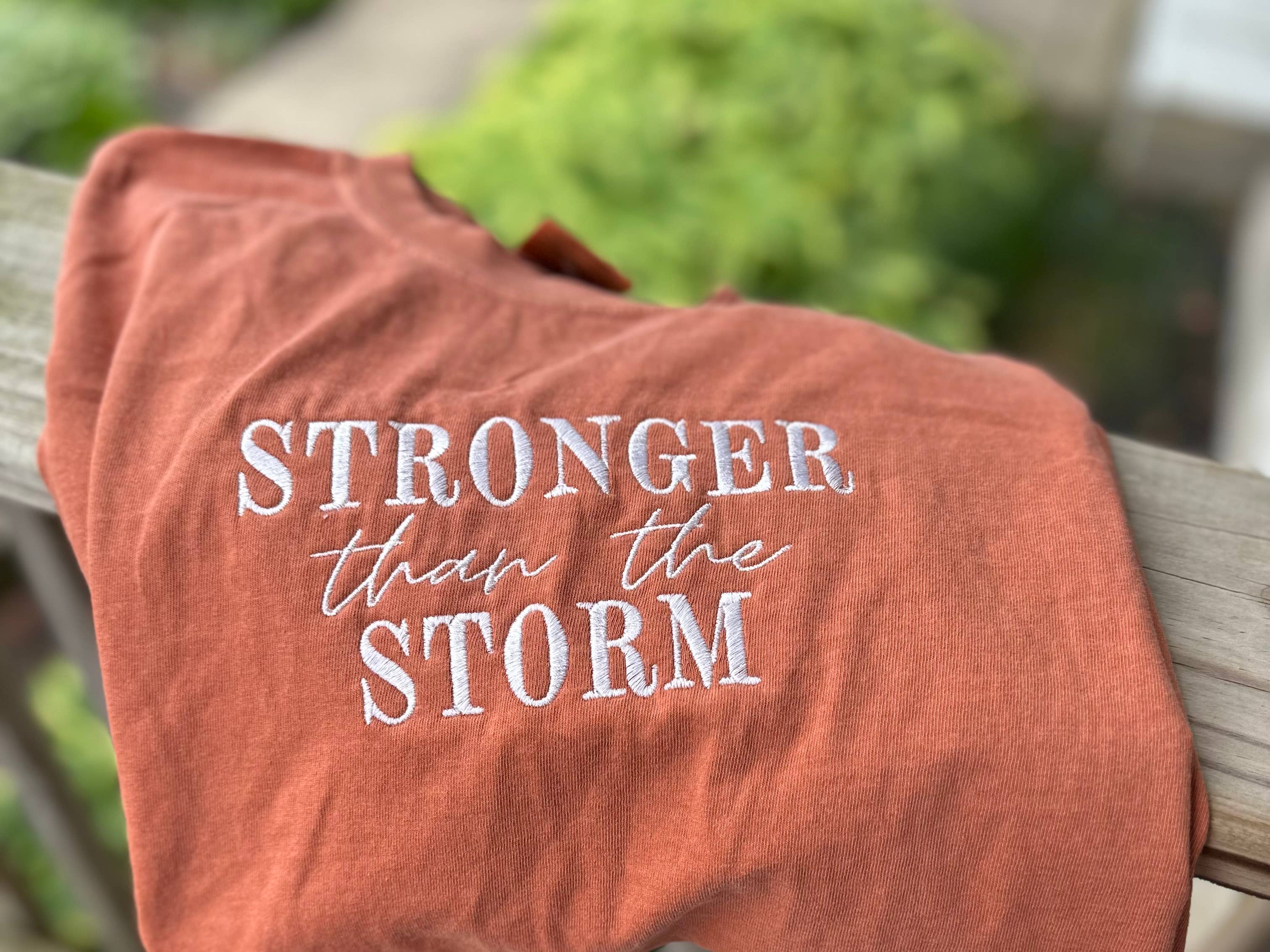 Your Embroidery Girl - Wholesale T-Shirt - Women's - Stronger Than The Storm Comfort Colors T-Shirt0