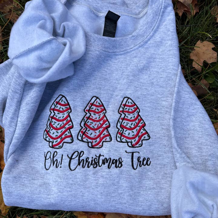 Oh Christmas tree embroidered crewneck.  and other Purchase Wholesale tisch. Free Returns & Net 60 Terms on Faire trending on Faire.