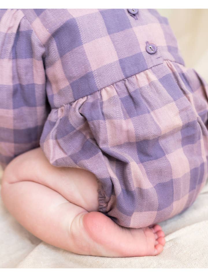 Lilac Smocked Peter Pan Gingham Baby Romper (Organic) for wholesale on Faire