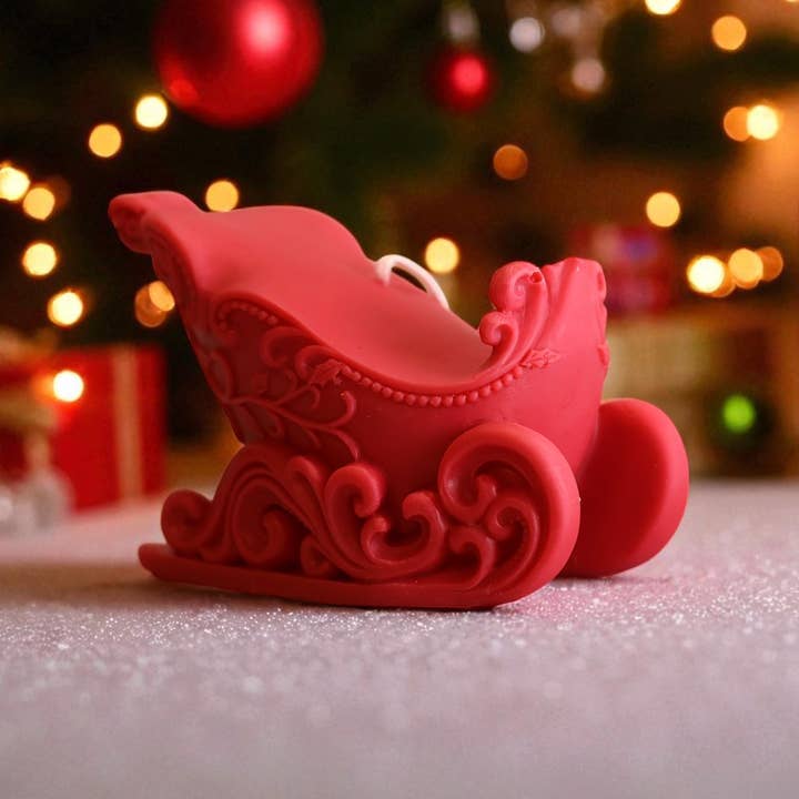 Weihnachtskerze Schlitten, 10 x 15 cm    für den Großhandel von Agaboo Candle