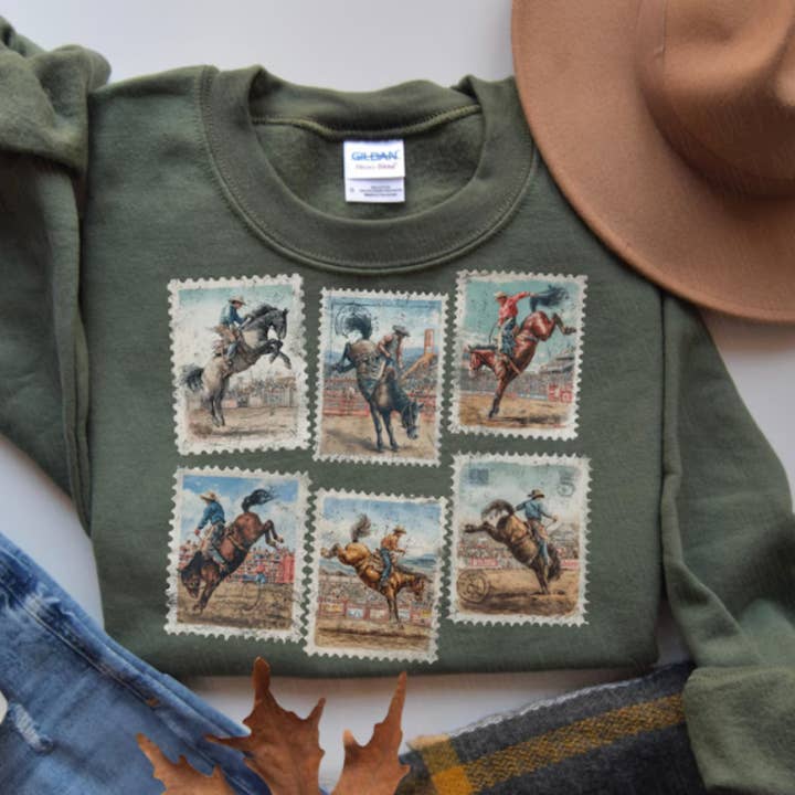 Western Rodeo Cowboy Horse Bucking Graphic Sweater or Shirt for wholesale by Sam & Seb Co.