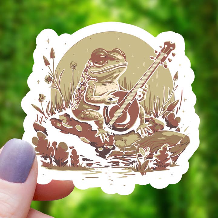 Cottagecore Frog Playing Banjo Sticker - 3" for wholesale by Mimic Gaming Co