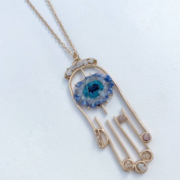 Cool Blues Healing Crystal Hamsa Necklace – Rough Diamonds & Sodalite for wholesale on Faire0