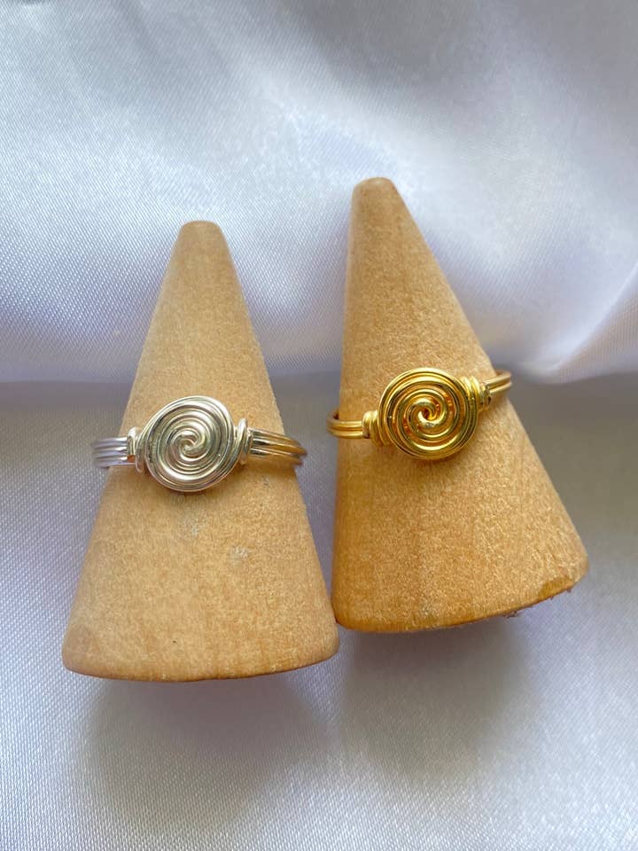 Wire-wrapped spiral rings, handcrafted swirl stacking rings for wholesale by Manifest Harmony