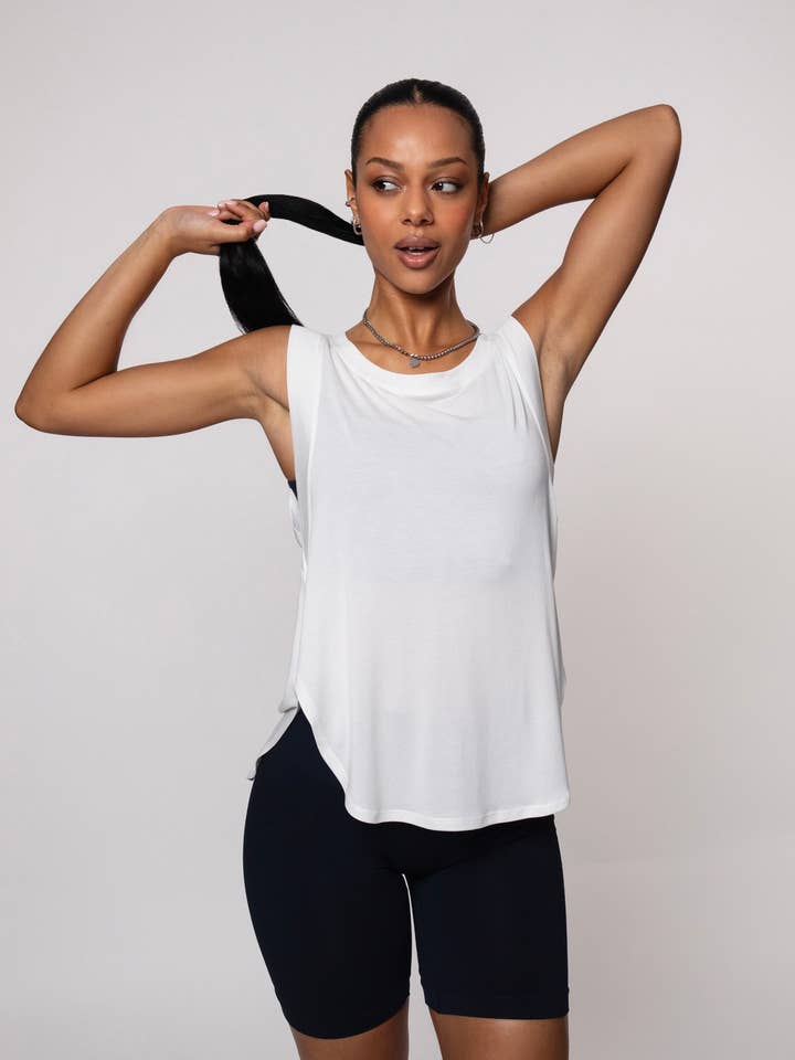 Canotta da allenamento in bianco per la vendita all'ingrosso da parte di Believe Athletics