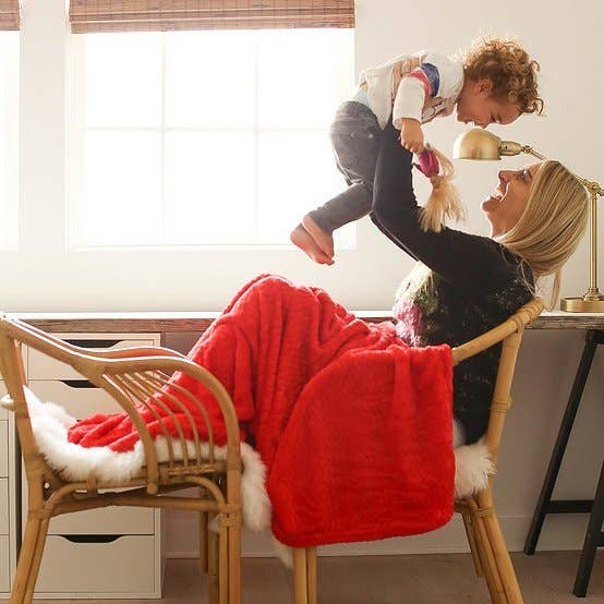 Blanket With a Foot Pocket in Lipstick Red for wholesale by PediPocket: The Foot Pocket Blanket