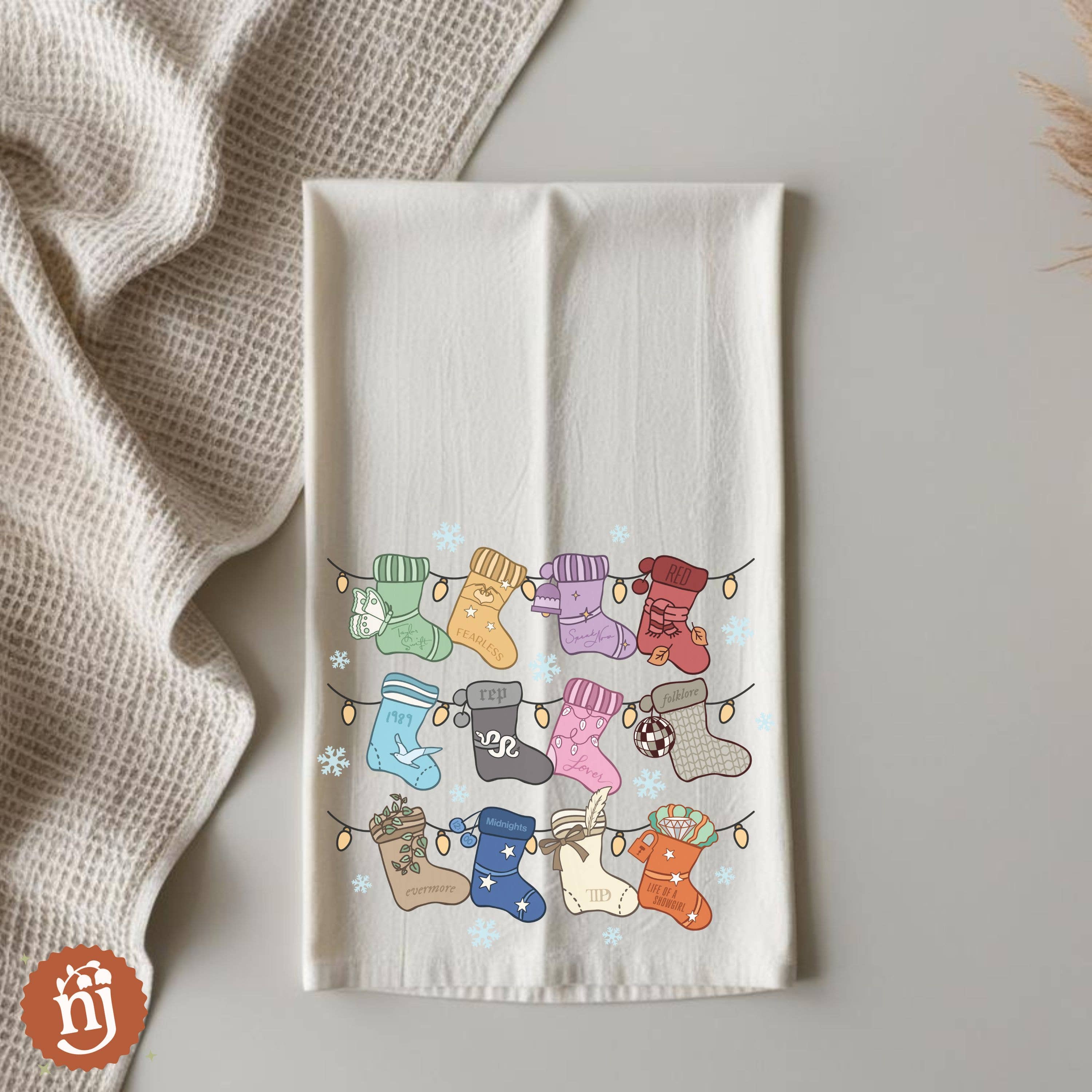 Nearly June Design Co - Wholesale Tea Towel - Eras Inspired Christmas Stockings Tea Towel1