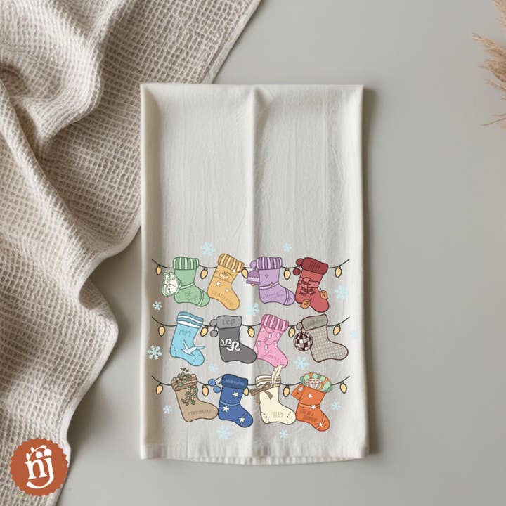 Nearly June Design Co - Wholesale Tea Towel - Eras Inspired Christmas Stockings Tea Towel1