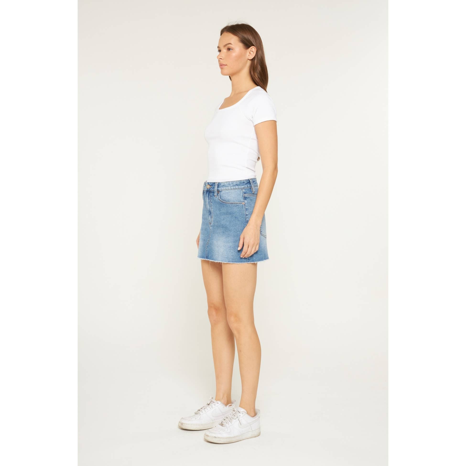 LIGHT SMOG INDIGO HIGH RISE RAW HEM MINI SKIRT for wholesale on Faire3