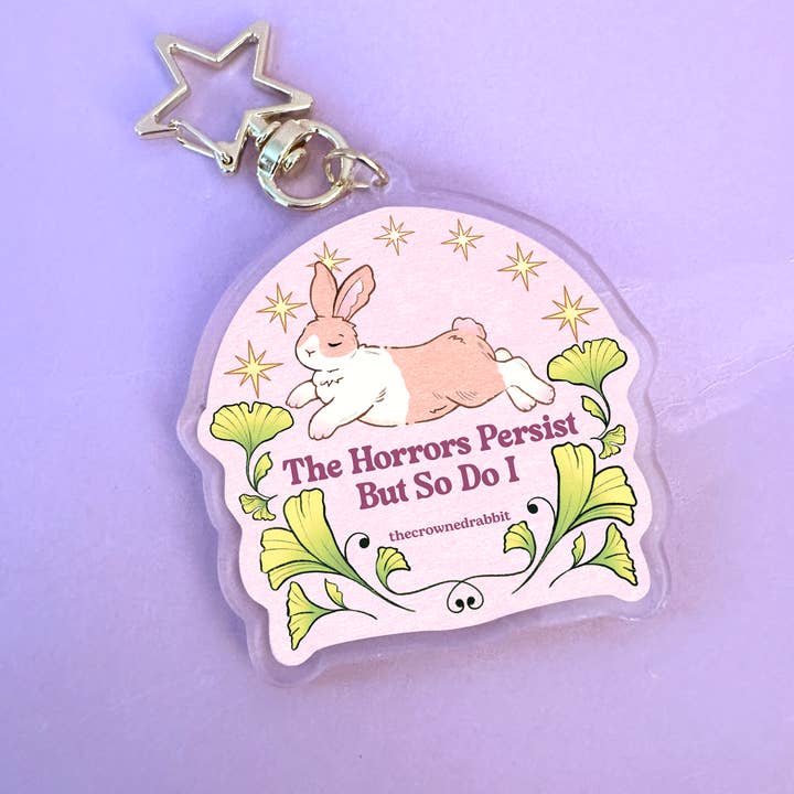 Horrors Persist, But So Do I Rabbit Acrylic Keychain for wholesale by The Crowned Rabbit