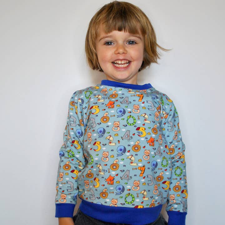 Unisex Kindertrui met Ronde Hals. voor wholesale door ILLUSTRABIMBI