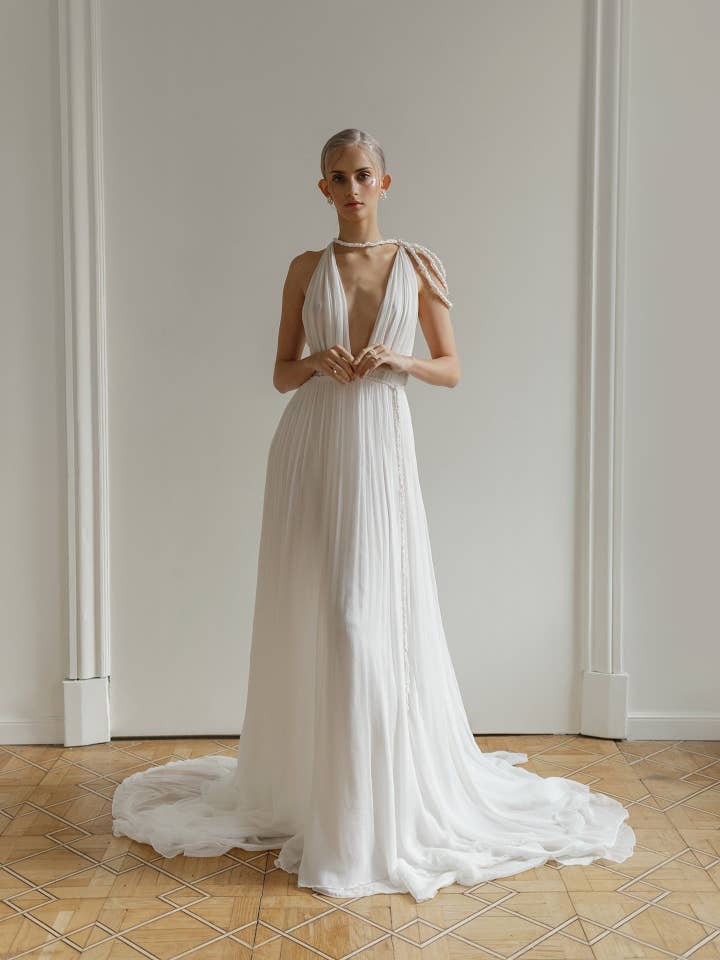 Backless wedding dress deep V-neckline for wholesale by Lutien Bridal