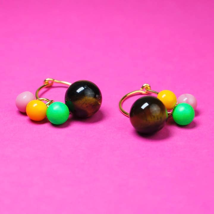 Creoles with variable pendants "EDGY" for wholesale by BaBa Jewellery for happiness