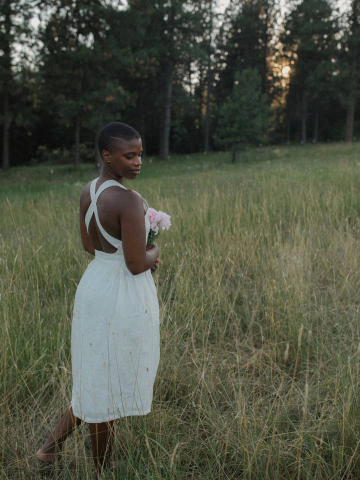 Judith Dress in Seashell Linen-Pinafore Cross Back Dress for wholesale by Wilder Collective