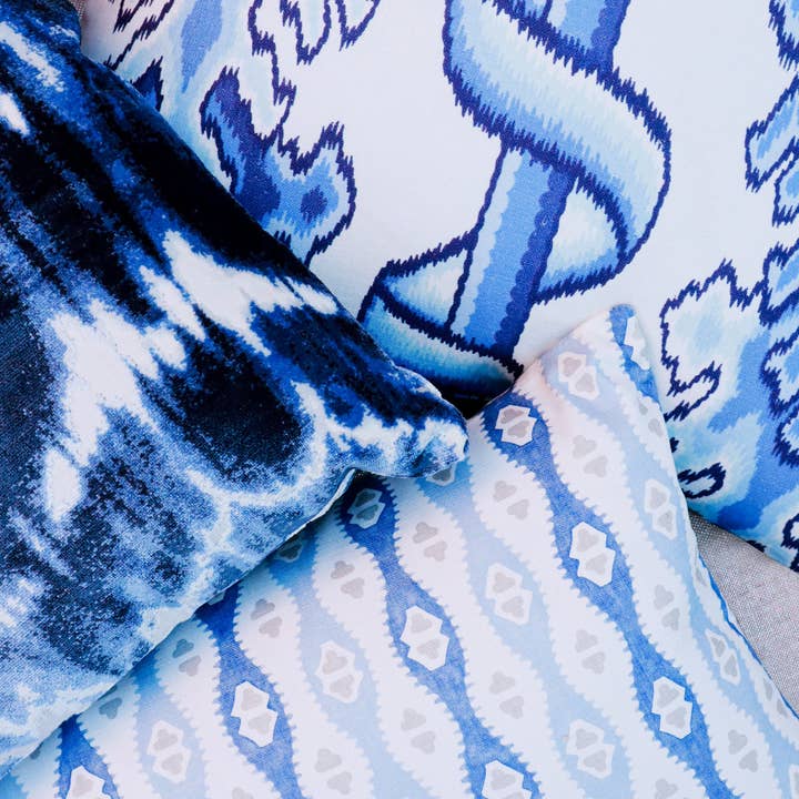 Nova Blue and White Ikat Throw Pillow for wholesale on Faire