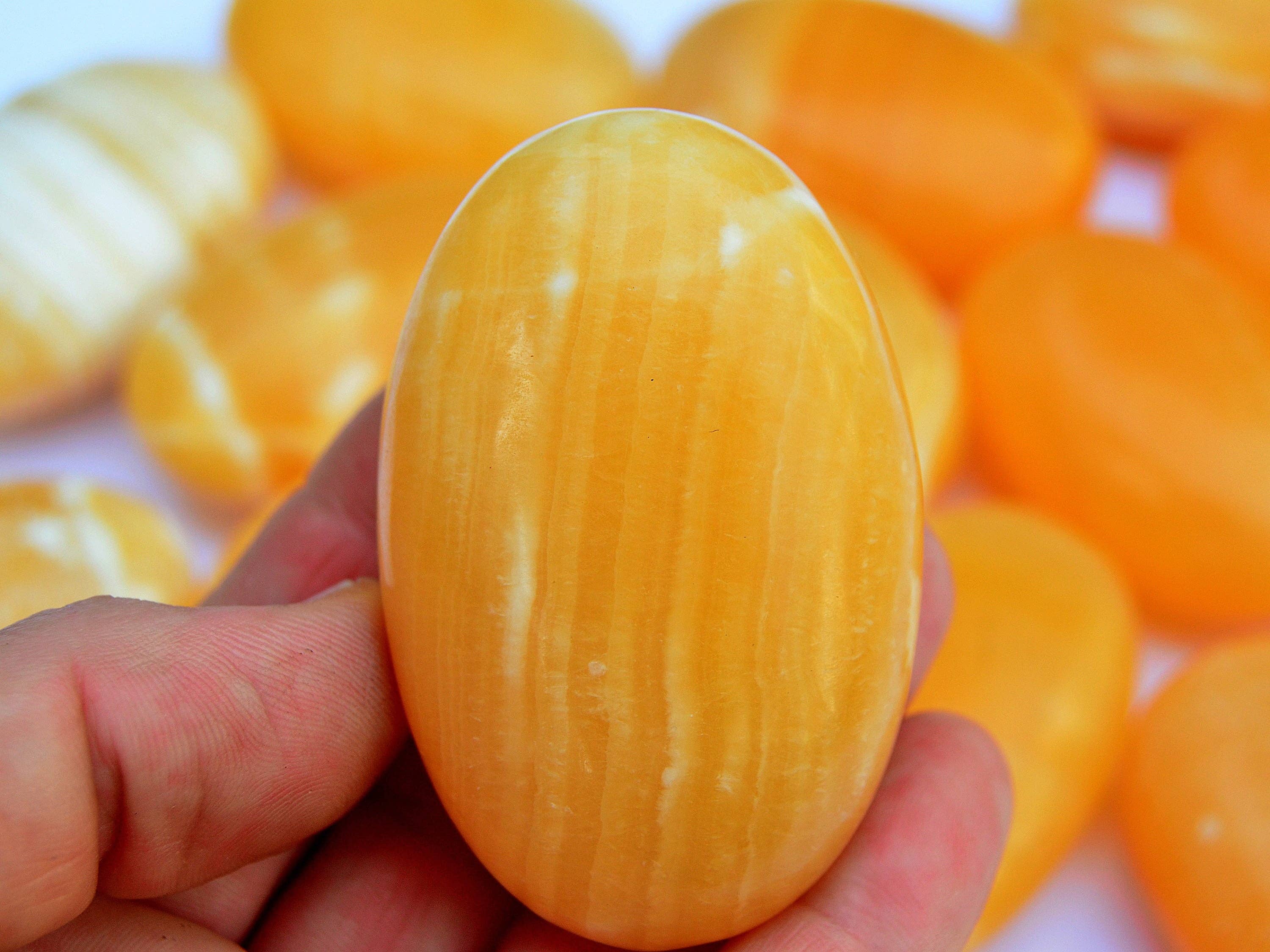 Kaia & Crystals - Wholesale Spiritual Stone/Crystal - Orange Calcite Palm Stone 1 Kg (8-10 Pcs) - (50mm - 70mm)6