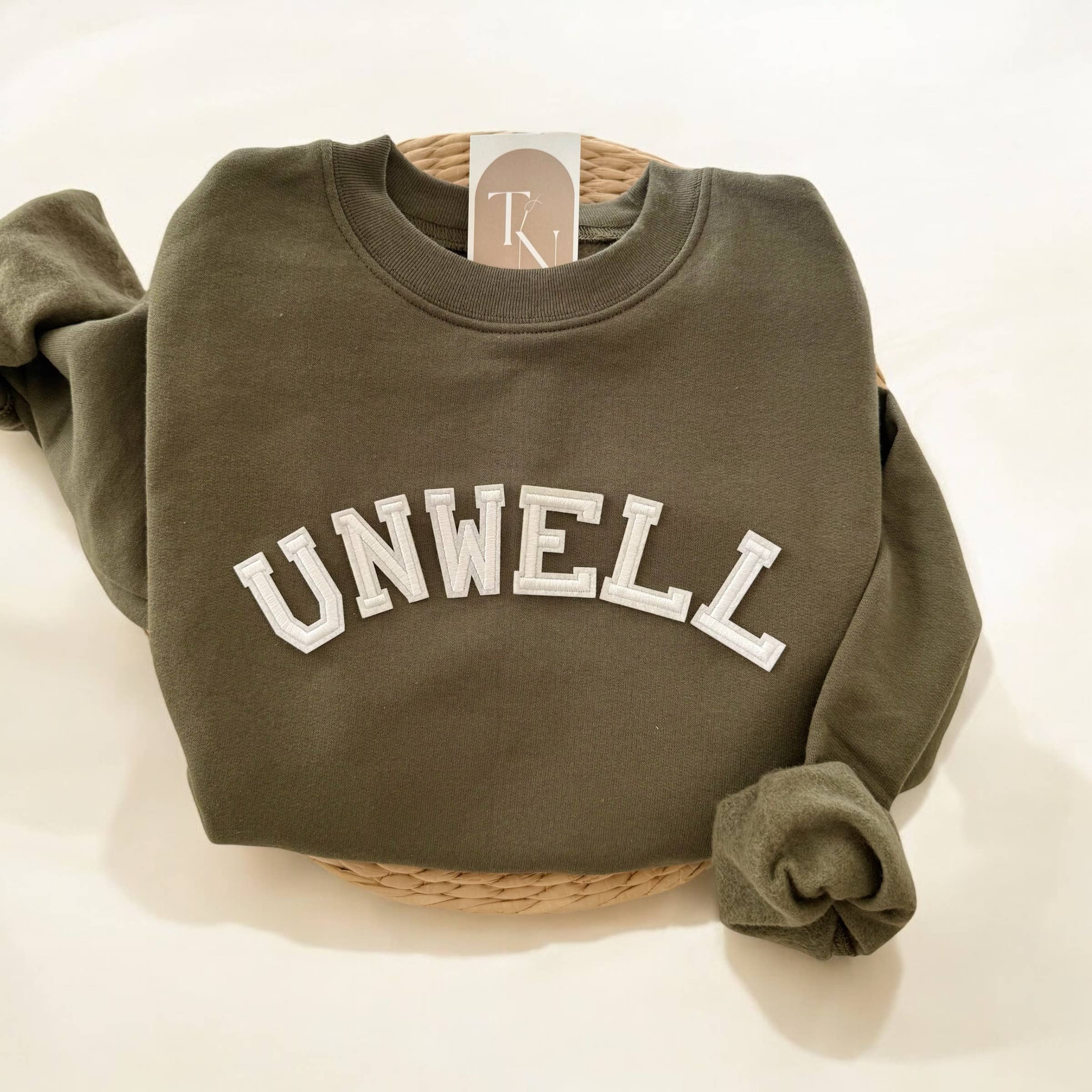 Threads And Needles, INC. – wholesale Graphic sweatshirt – Women’s – UNWELL Sweatshirt, Funny Sweatshirts0