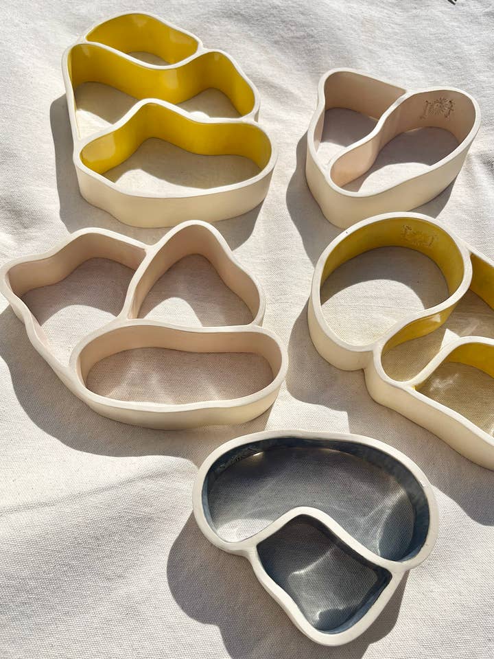 Tana/muro Ofrenda per la vendita all'ingrosso da parte di Roaming Barefoot